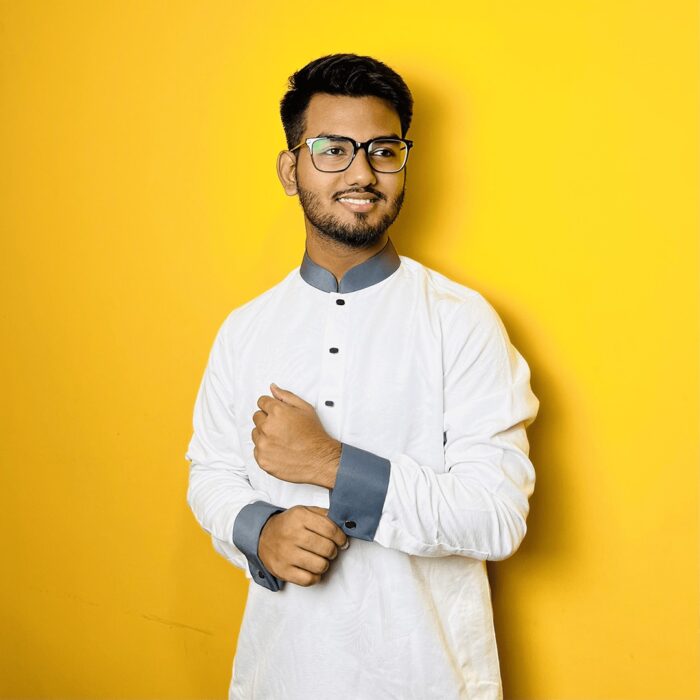 White Solid: Intricate Hand-Crafted Panjabi - Image 1